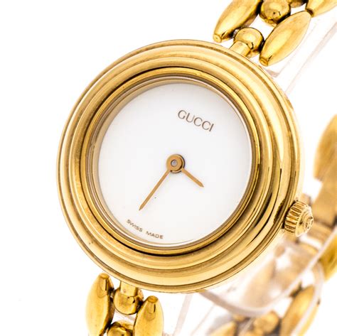 gucci ladies watch interchangeable bezel.